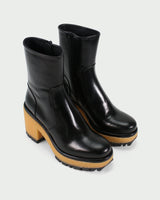 Homers Stiefeletten Absatz